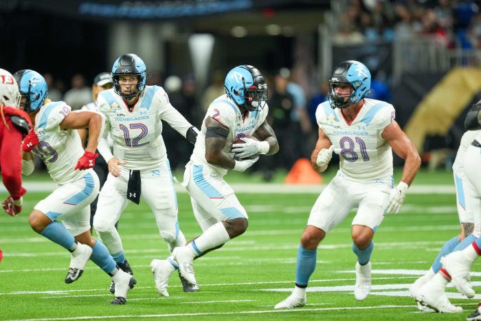 May 13, 2023; San Antonio, TX, USA; Arlington Renegades running back De Veon Smith (2) takes a handoff from Arlington Renegades quarterback Luis Perez (12) in the second half at the Alamodome. Mandatory Credit: Daniel Dunn-USA TODAY Sports